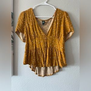 Mustard color, floral blouse with slight opening in the front, size large